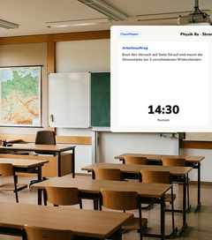 Klassenraum der Sekundarstufe mit Timer und Gruppen am Beamer